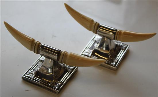 Pair of late Victorian silver and ivory knife rests